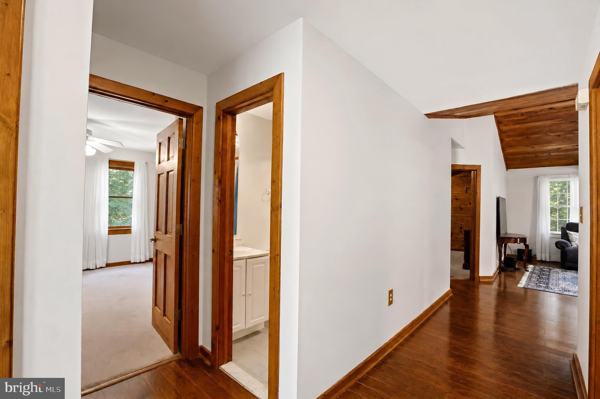 14575 Honeysuckle Way Issue, MD 20645 - Photo 11 of 49 a view of hallway with livingroom and wooden floor