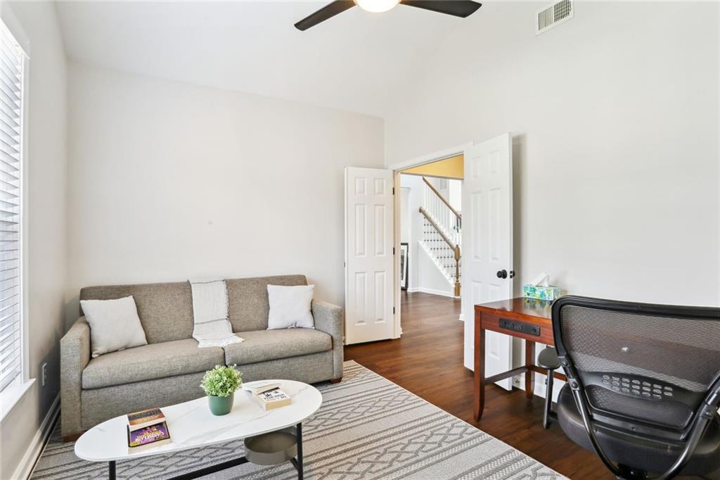 5161 Madison Green Drive Southwest Mableton, GA 30126 - Photo 20 of 40 a living room with furniture and wooden floor