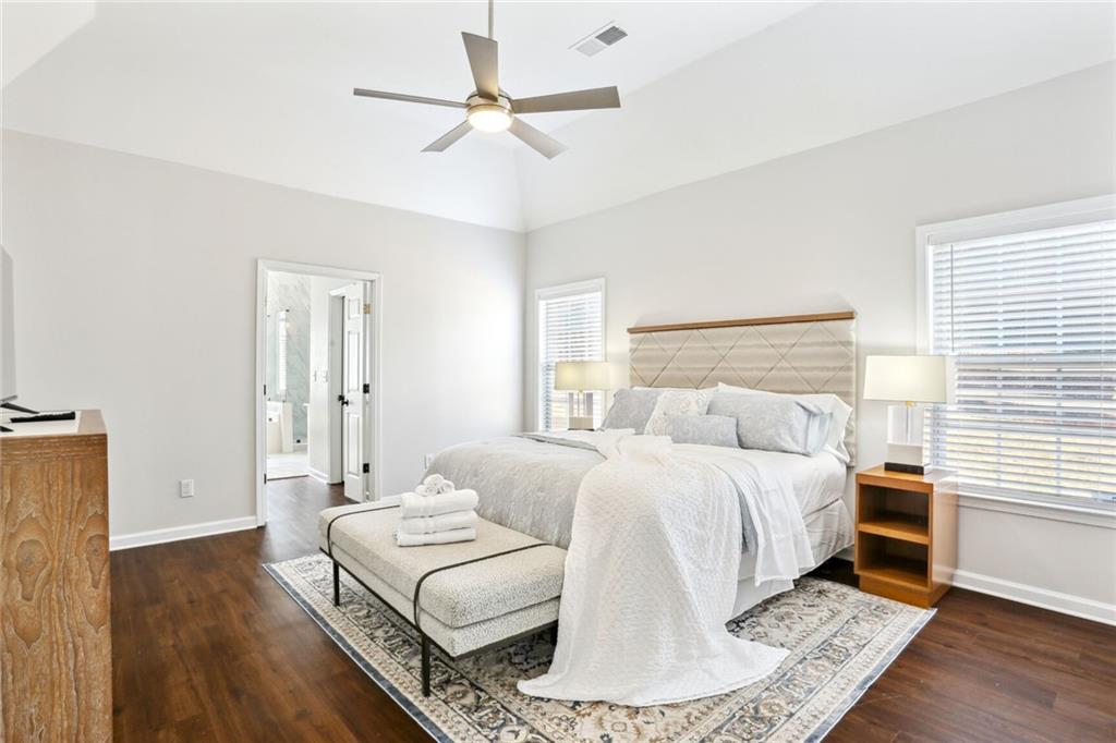5161 Madison Green Drive Southwest Mableton, GA 30126 - Photo 21 of 40 a room with a bed and a couch