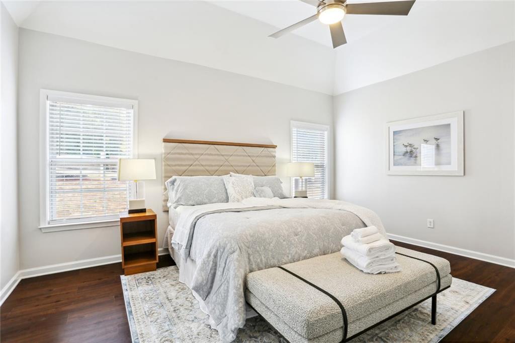 5161 Madison Green Drive Southwest Mableton, GA 30126 - Photo 23 of 40 a bedroom with a bed and wooden floor