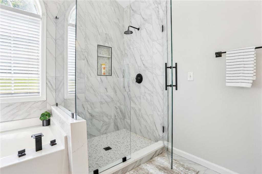 5161 Madison Green Drive Southwest Mableton, GA 30126 - Photo 27 of 40 a bathroom with a shower