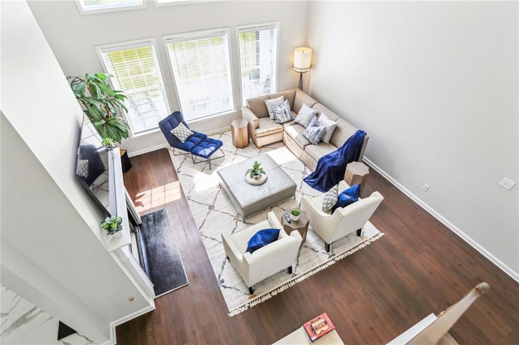 5161 Madison Green Drive Southwest Mableton, GA 30126 - Photo 7 of 40 a living room with furniture and a wooden floor