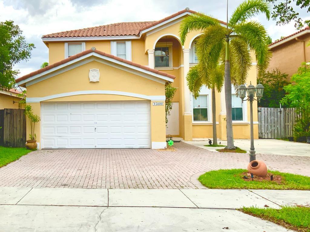 15809 Southwest 60th Terrace Miami, FL 33193 - Photo 1 of 20 a front view of a house
