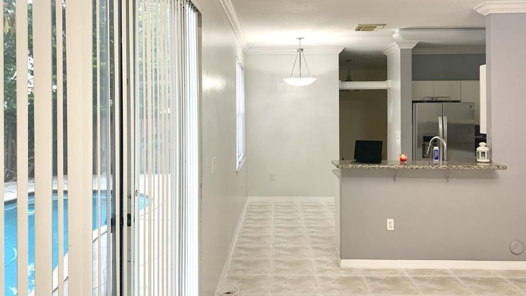 15809 Southwest 60th Terrace Miami, FL 33193 - Photo 9 of 20 a bathroom with a sink and a mirror
