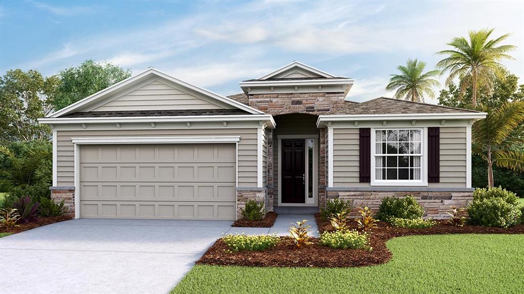 1220 Northwest 133rd Way Gainesville, FL 32606 - Photo 1 of 1 front view of a house with a yard