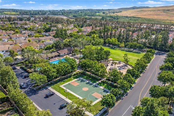 a kitchen with a sink and stove top oven