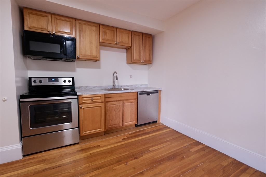 26 Cleveland Street, Unit A Dedham, MA 02026 - Photo 6 of 28