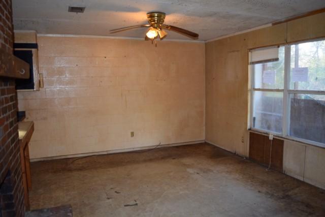 623 West Griffith Avenue Crestview, FL 32536 - Photo 4 of 11 a view of empty room with windows