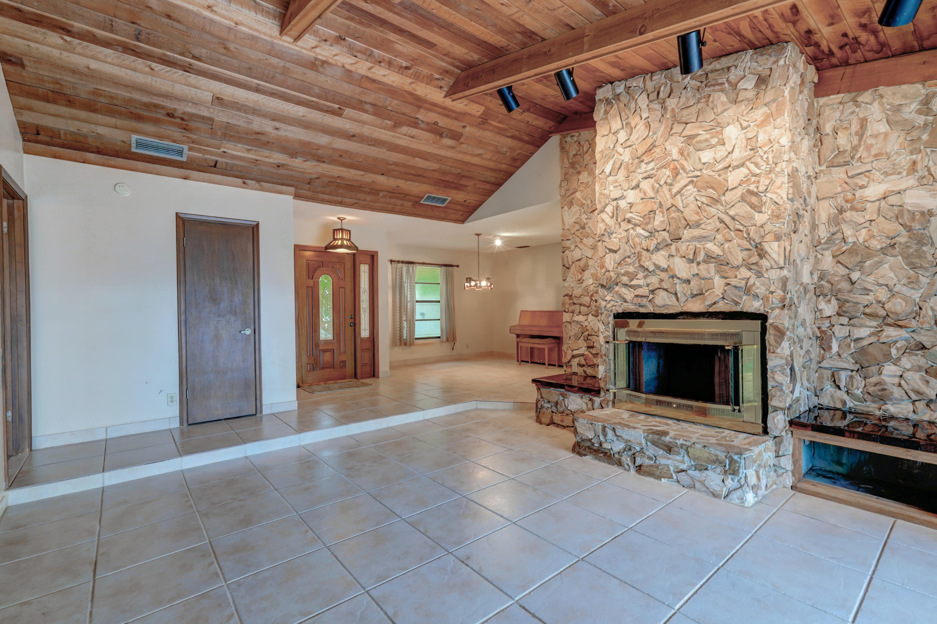 1300 Southwest 2nd Street Boca Raton, FL 33486 - Photo 7 of 18 a living room with furniture and a fireplace
