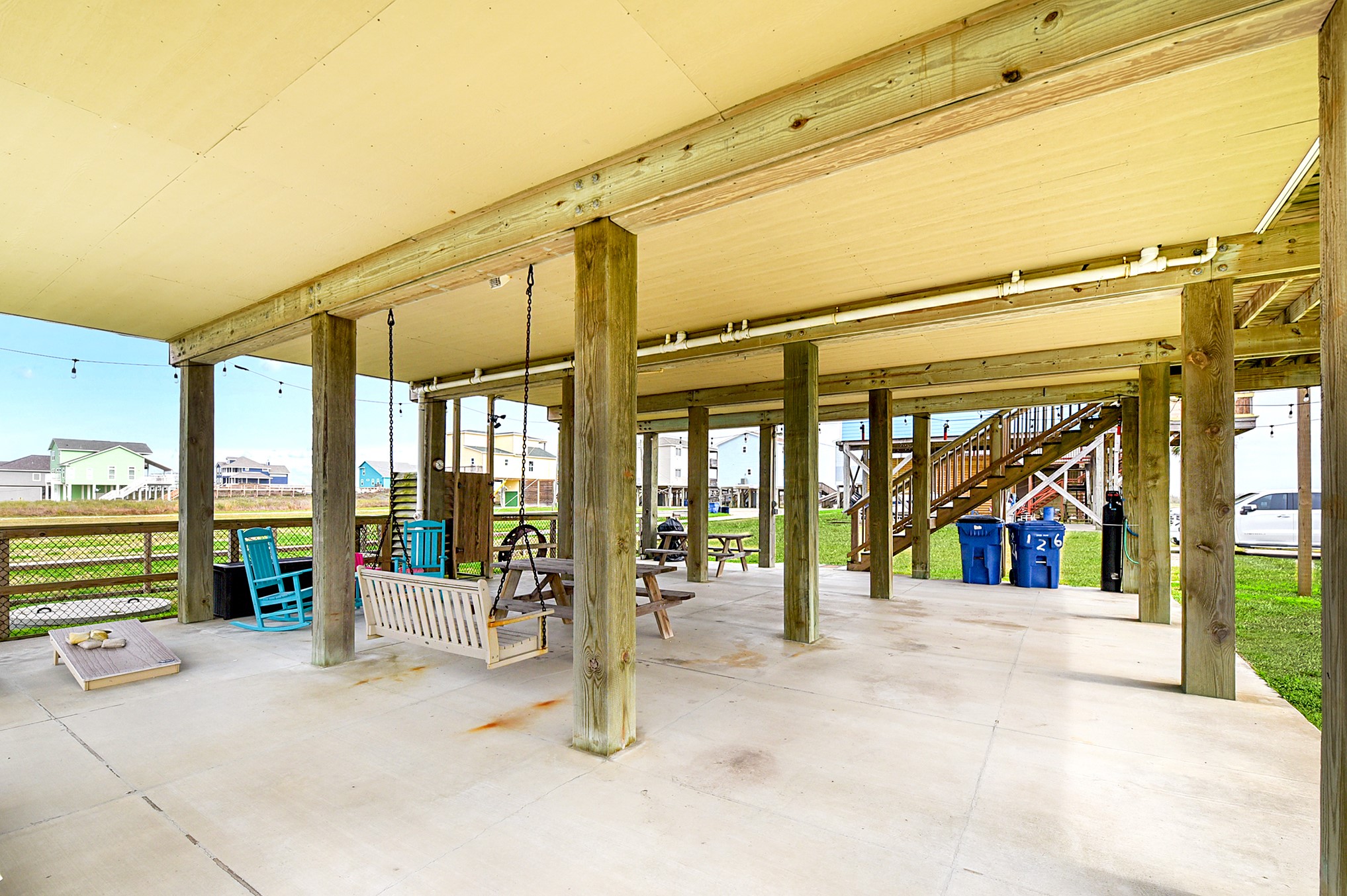 126 Nesmith Place Surfside Beach, TX 77541 - Photo 12 of 48 a view of a porch with a furniture