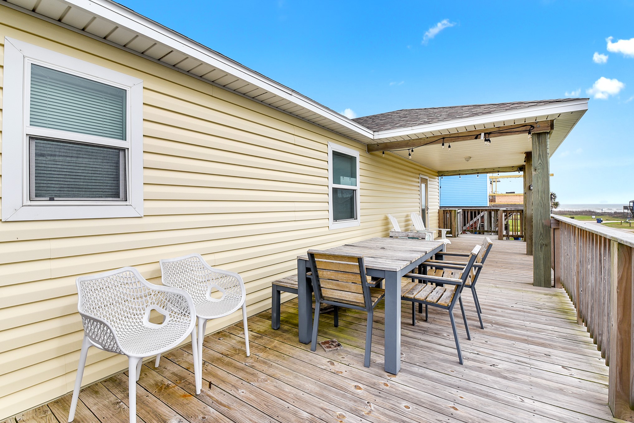 126 Nesmith Place Surfside Beach, TX 77541 - Photo 18 of 48 a patio with table and chairs