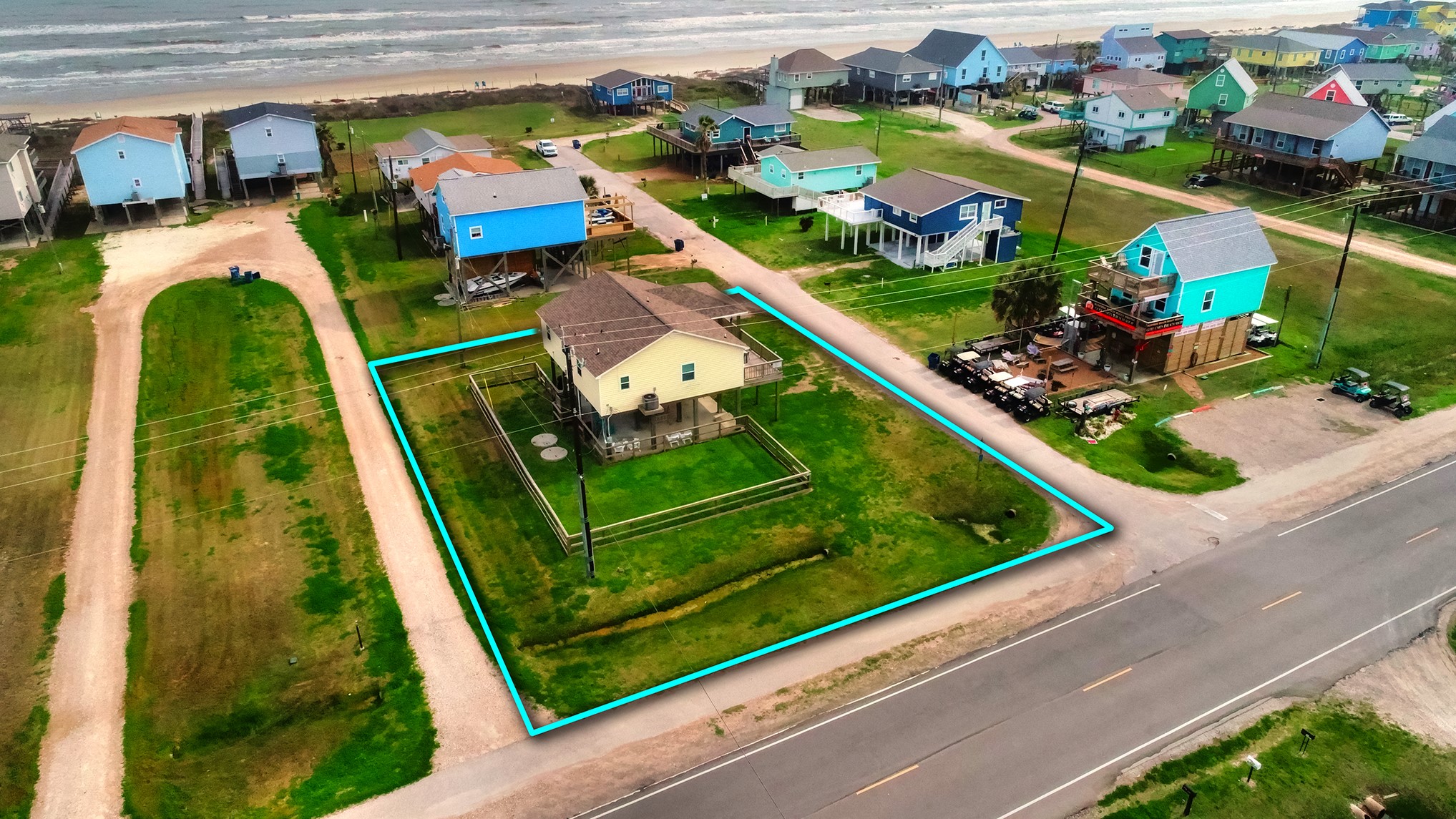 126 Nesmith Place Surfside Beach, TX 77541 - Photo 2 of 48 an aerial view of a residential houses with outdoor space
