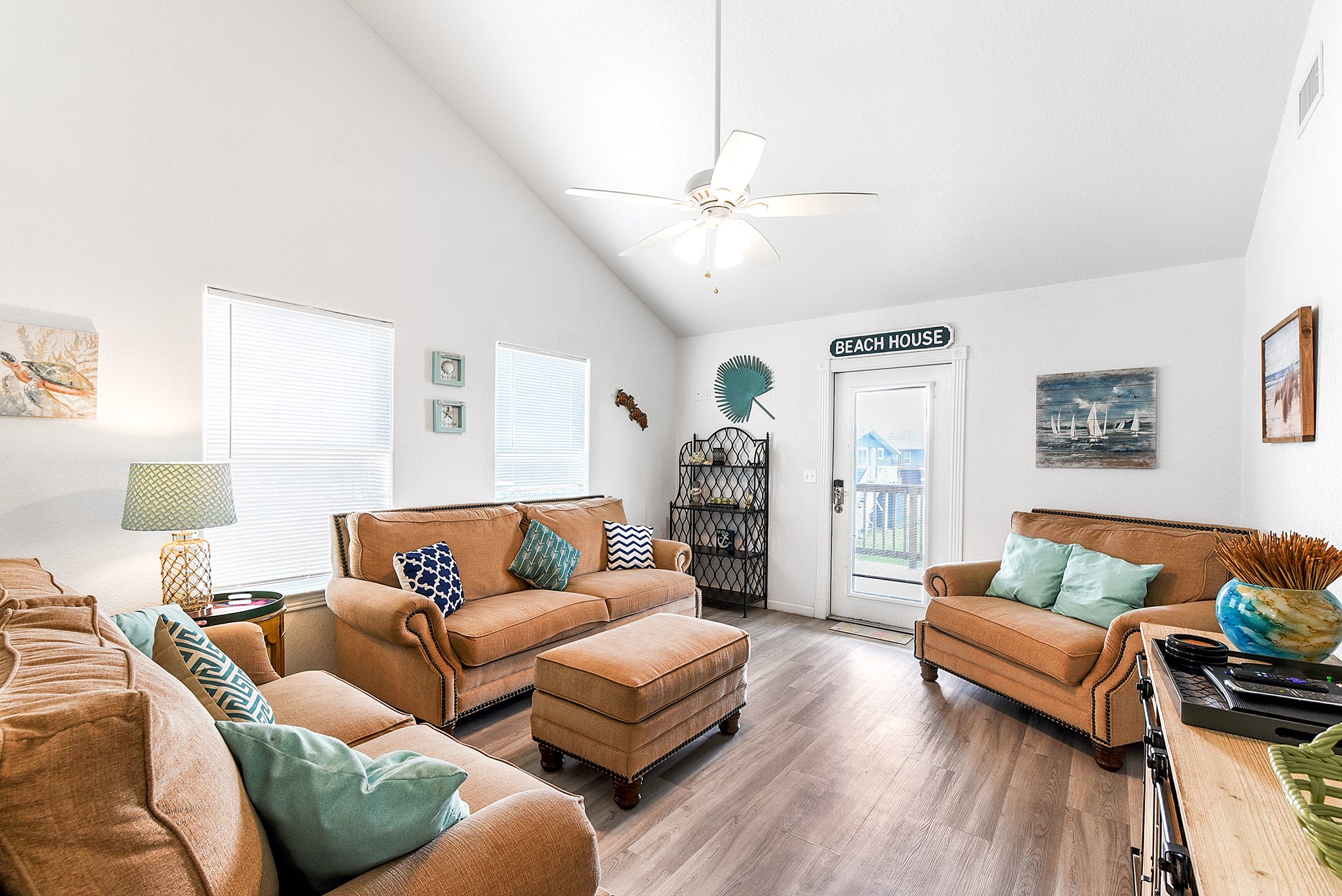 126 Nesmith Place Surfside Beach, TX 77541 - Photo 22 of 48 a living room with furniture and wooden floor