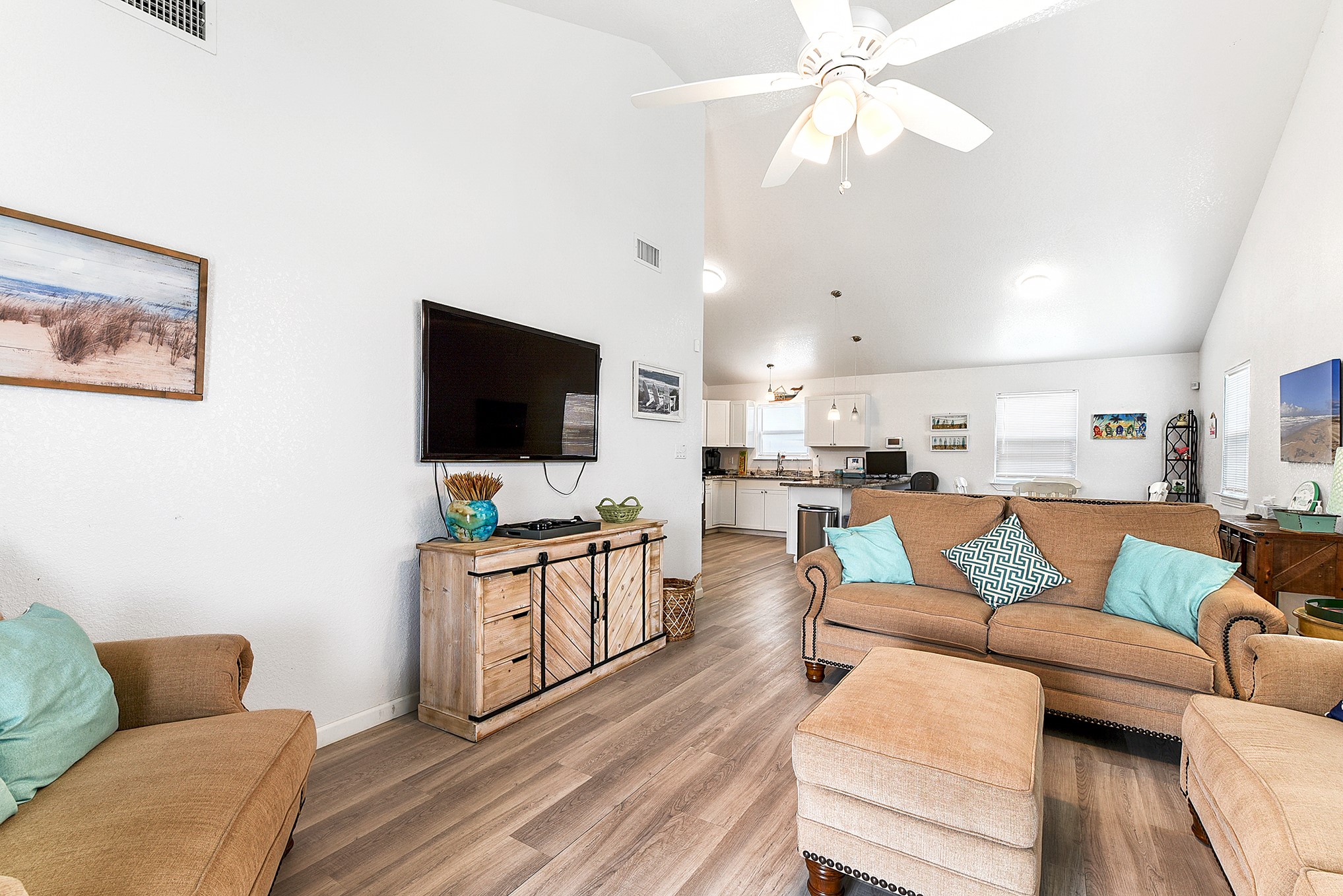 126 Nesmith Place Surfside Beach, TX 77541 - Photo 23 of 48 a living room with furniture and a flat screen tv