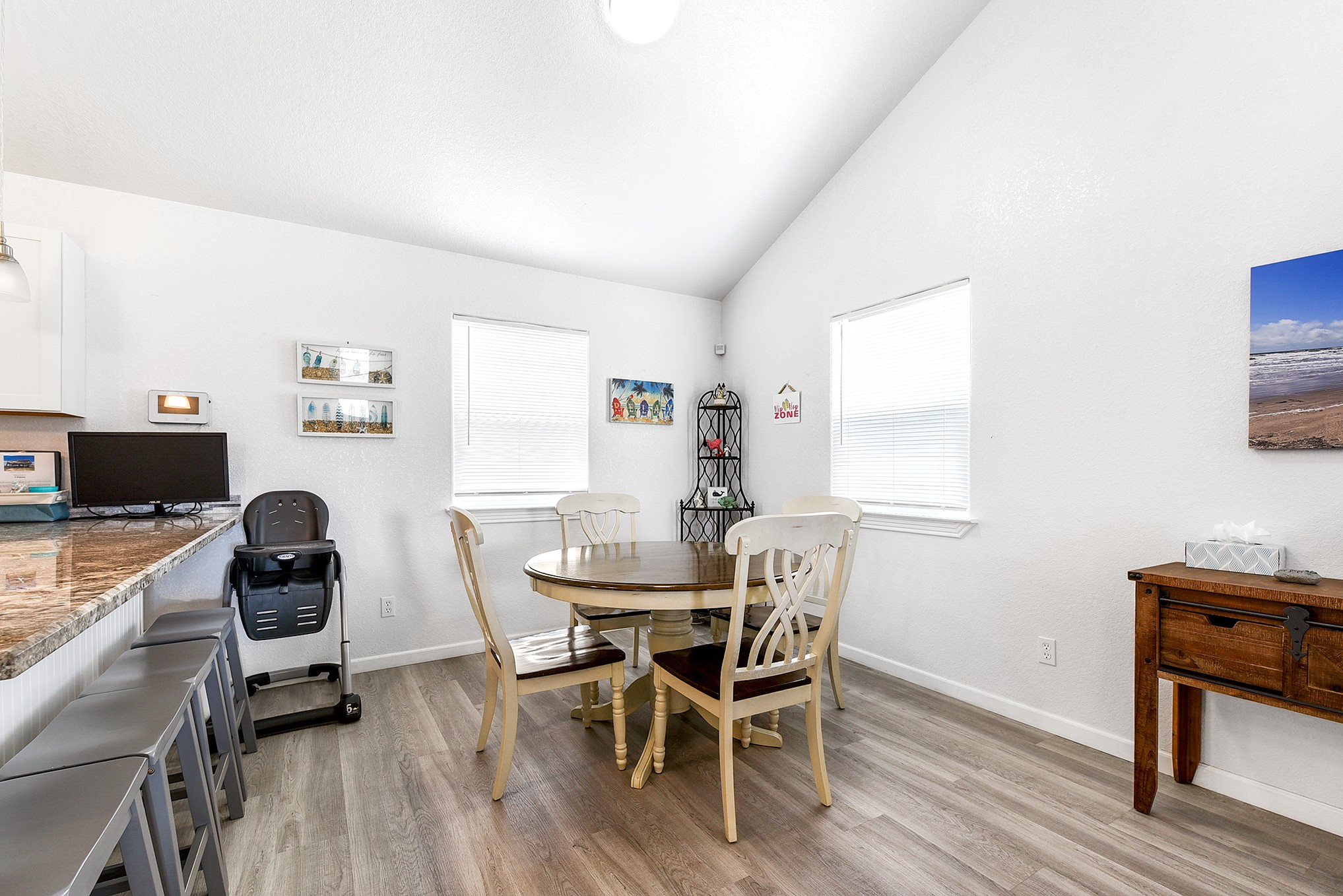126 Nesmith Place Surfside Beach, TX 77541 - Photo 25 of 48 a dining room with furniture and wooden floor
