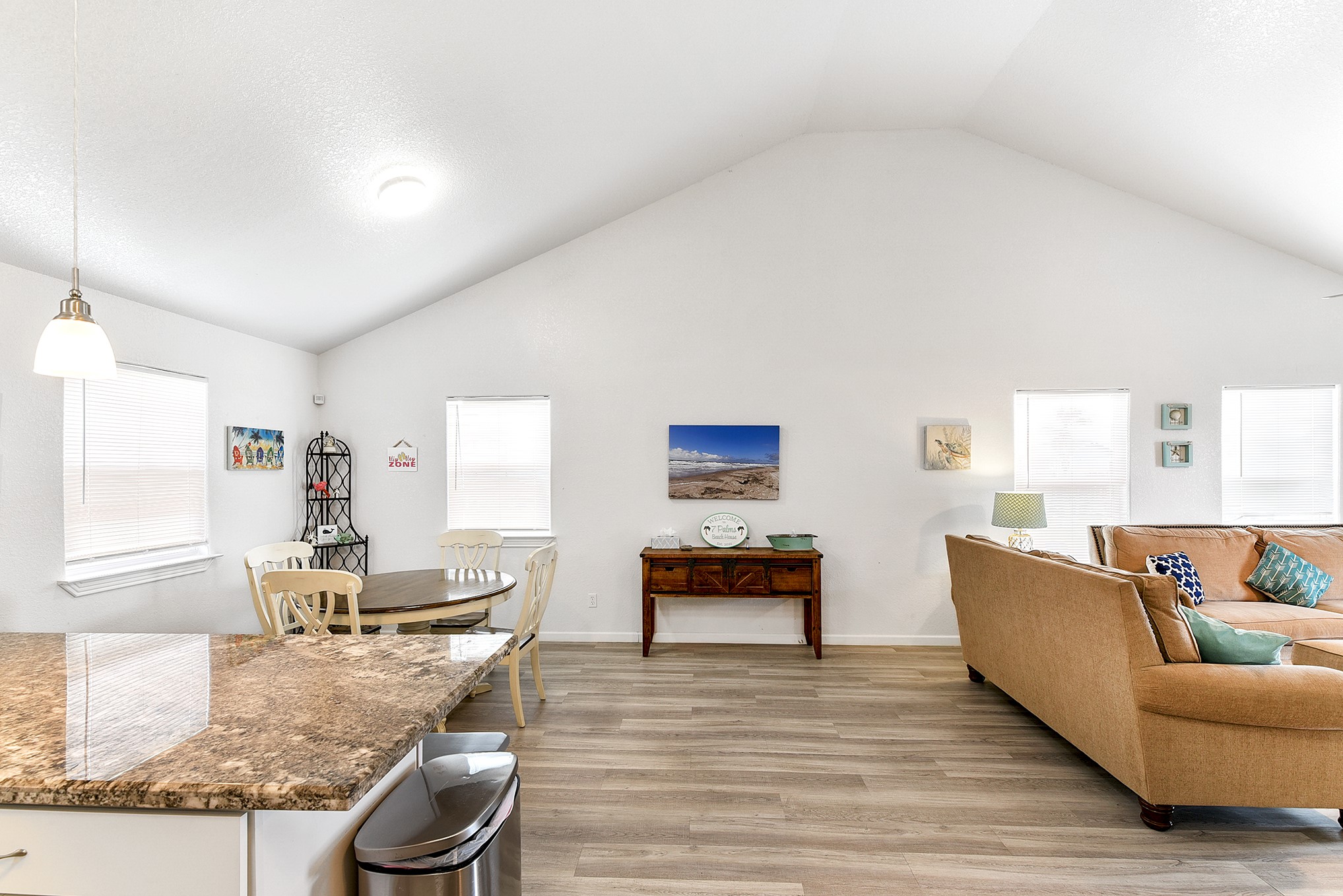 126 Nesmith Place Surfside Beach, TX 77541 - Photo 28 of 48 a living room with furniture and a wooden floor