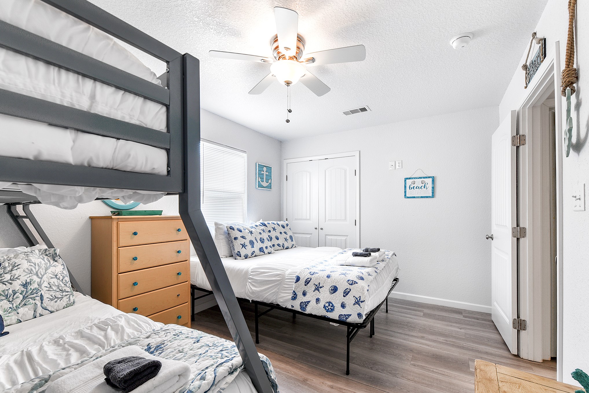 126 Nesmith Place Surfside Beach, TX 77541 - Photo 36 of 48 a bedroom with a bed and a dresser