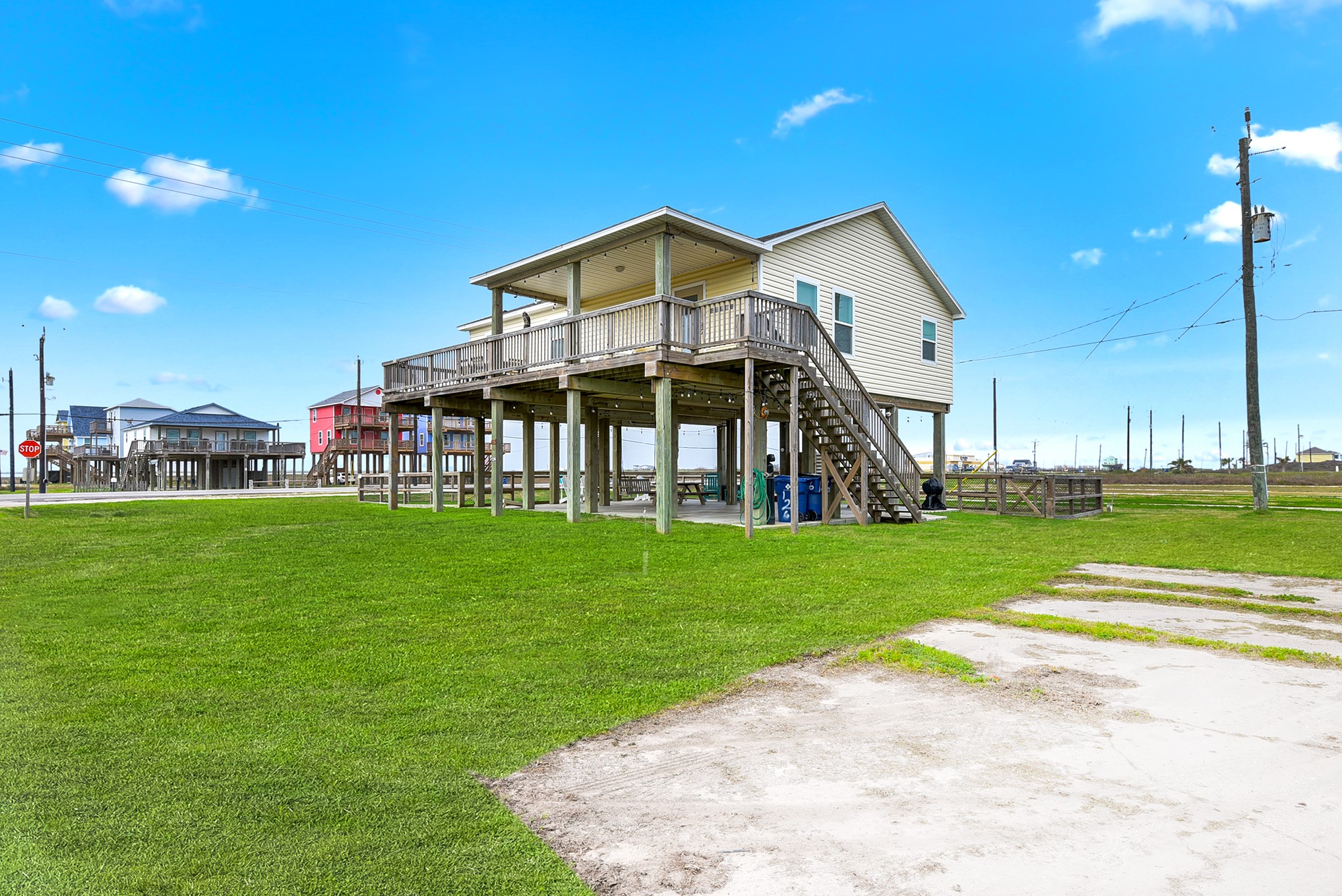 126 Nesmith Place Surfside Beach, TX 77541 - Photo 5 of 48 a view of a house with a big yard