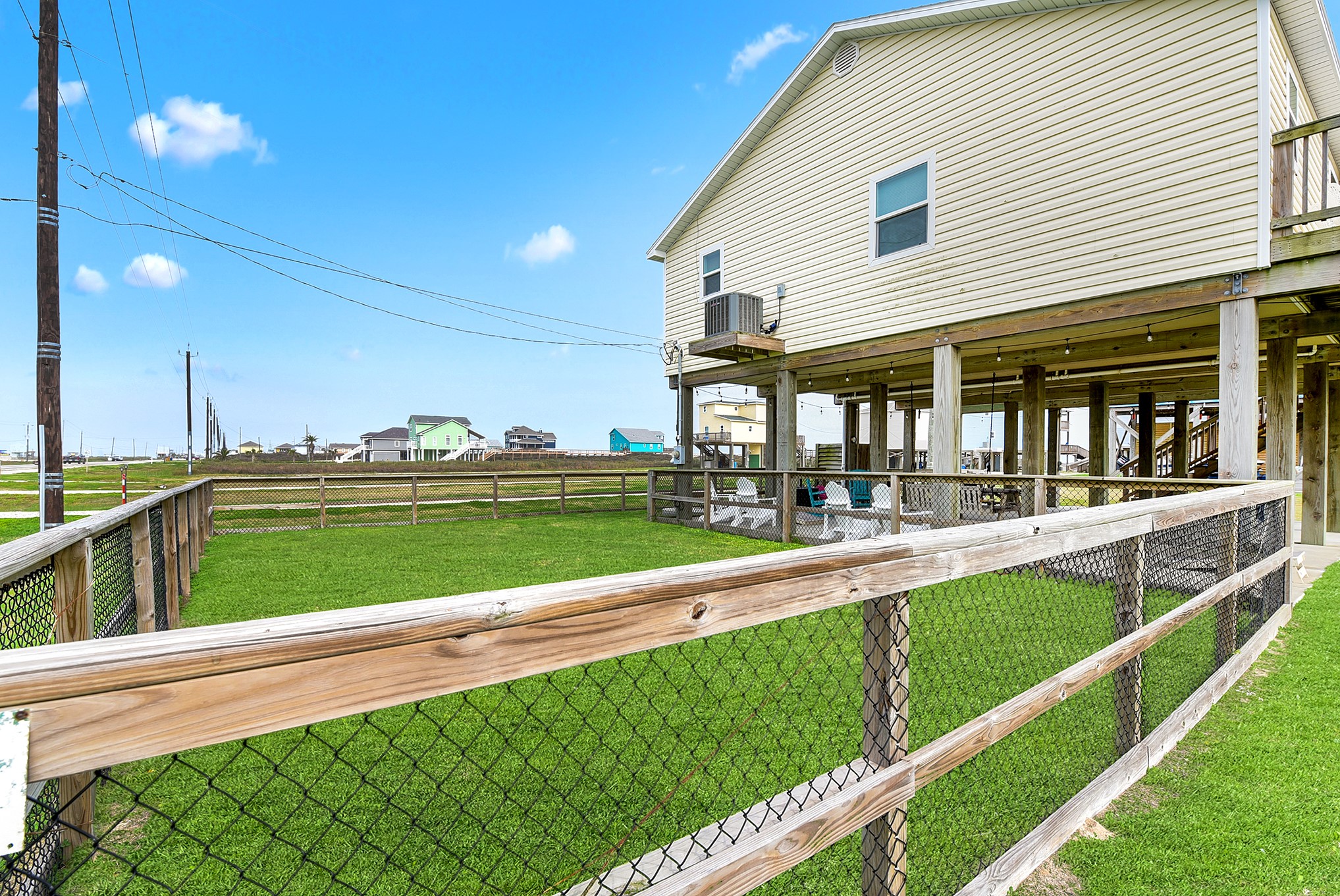126 Nesmith Place Surfside Beach, TX 77541 - Photo 8 of 48 a view of a house with a swimming pool