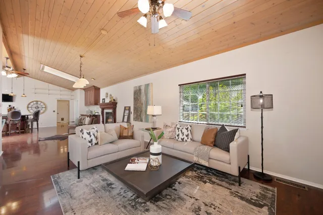 a bathroom with a shower and a glass door