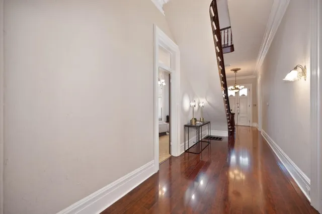 a view of house with outdoor seating and lake view
