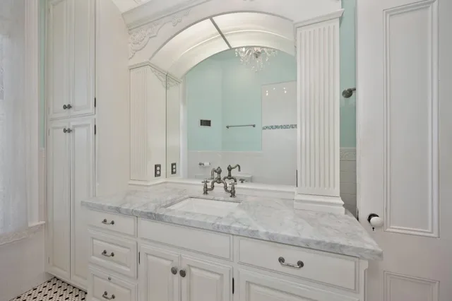 a view of wooden house with a lake view