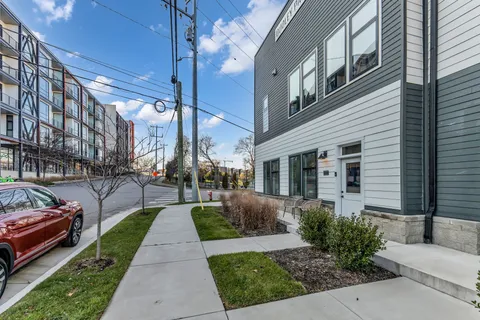a view of a building with a garden