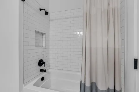 a bathroom with a bathtub