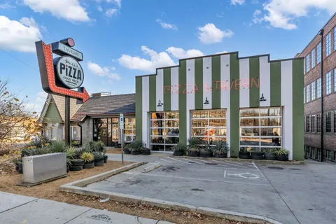 a sign broad in front of building