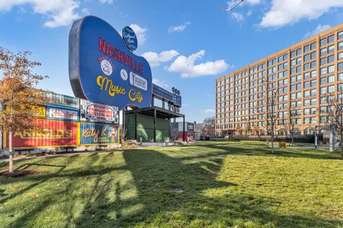 a view of a building with a swimming pool