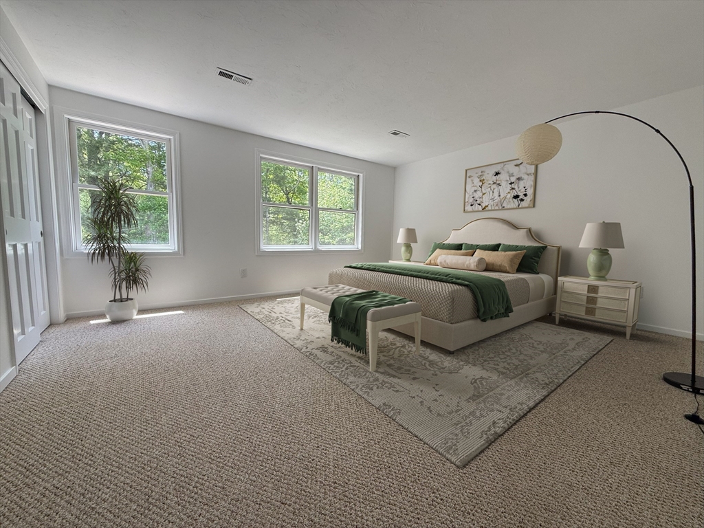 51 A Minot Avenue, Unit 1 Wareham, MA 02571 - Photo 12 of 26 a bedroom with bed and window