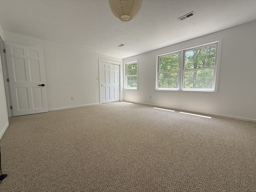 51 A Minot Avenue, Unit 1 Wareham, MA 02571 - Photo 14 of 26 a view of a room that has a window in it