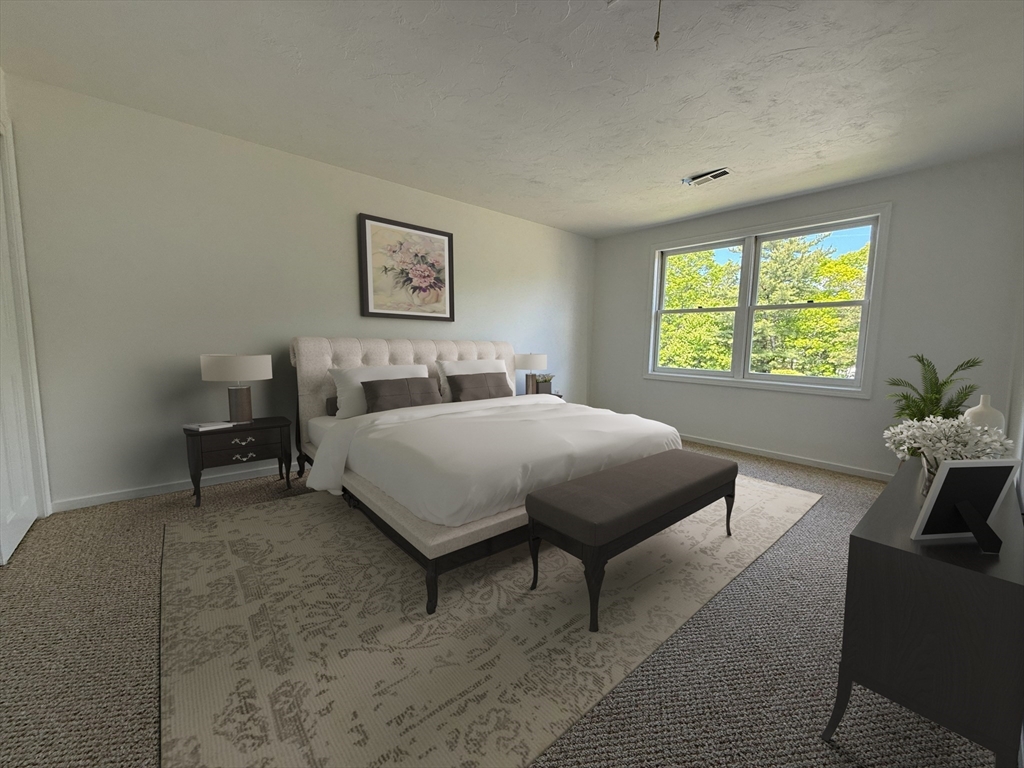 51 A Minot Avenue, Unit 1 Wareham, MA 02571 - Photo 16 of 26 a bedroom with a bed and window