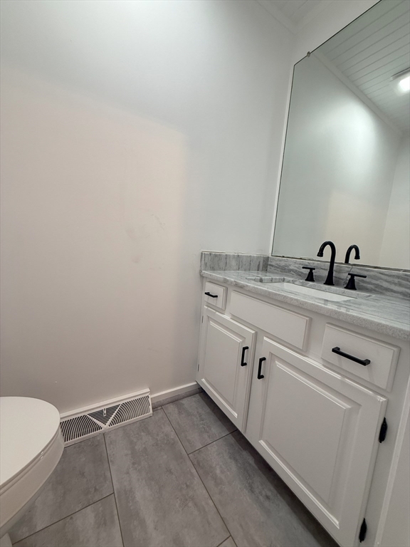 51 A Minot Avenue, Unit 1 Wareham, MA 02571 - Photo 19 of 26 a bathroom with a sink and vanity