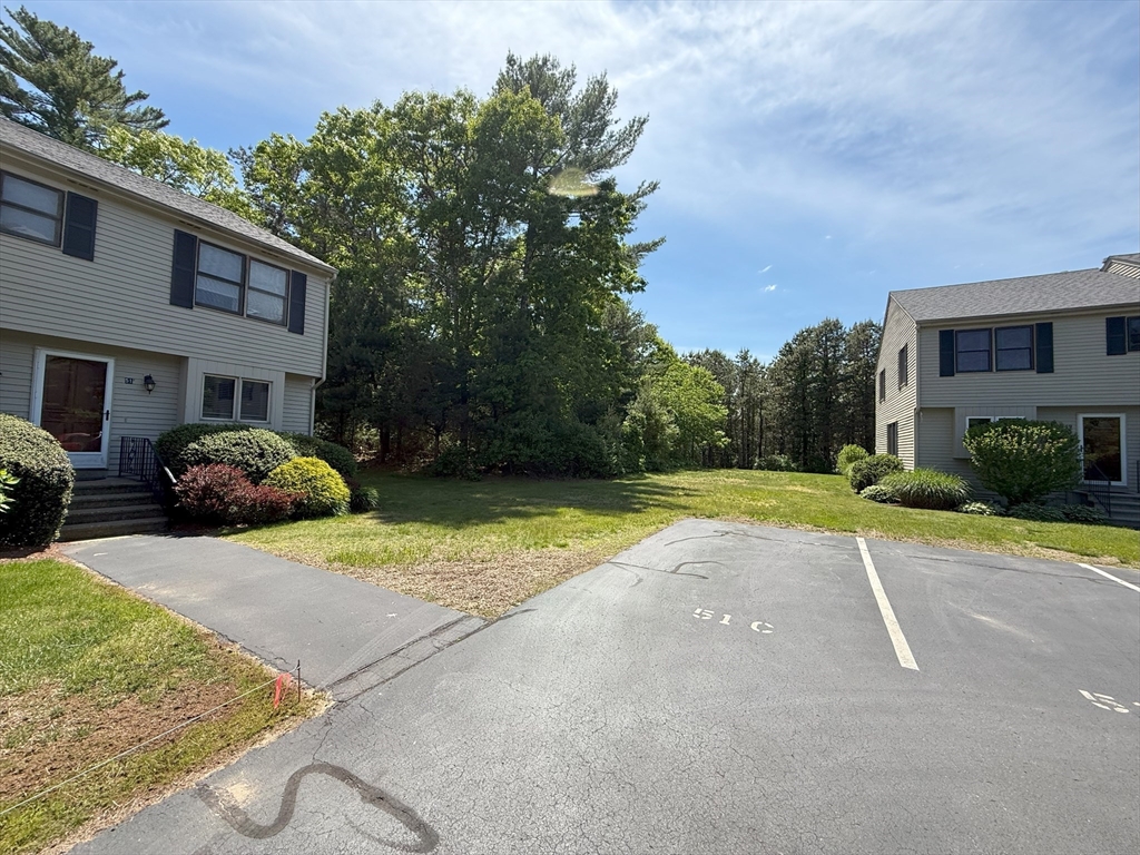 51 A Minot Avenue, Unit 1 Wareham, MA 02571 - Photo 23 of 26 a view of backyard of a house