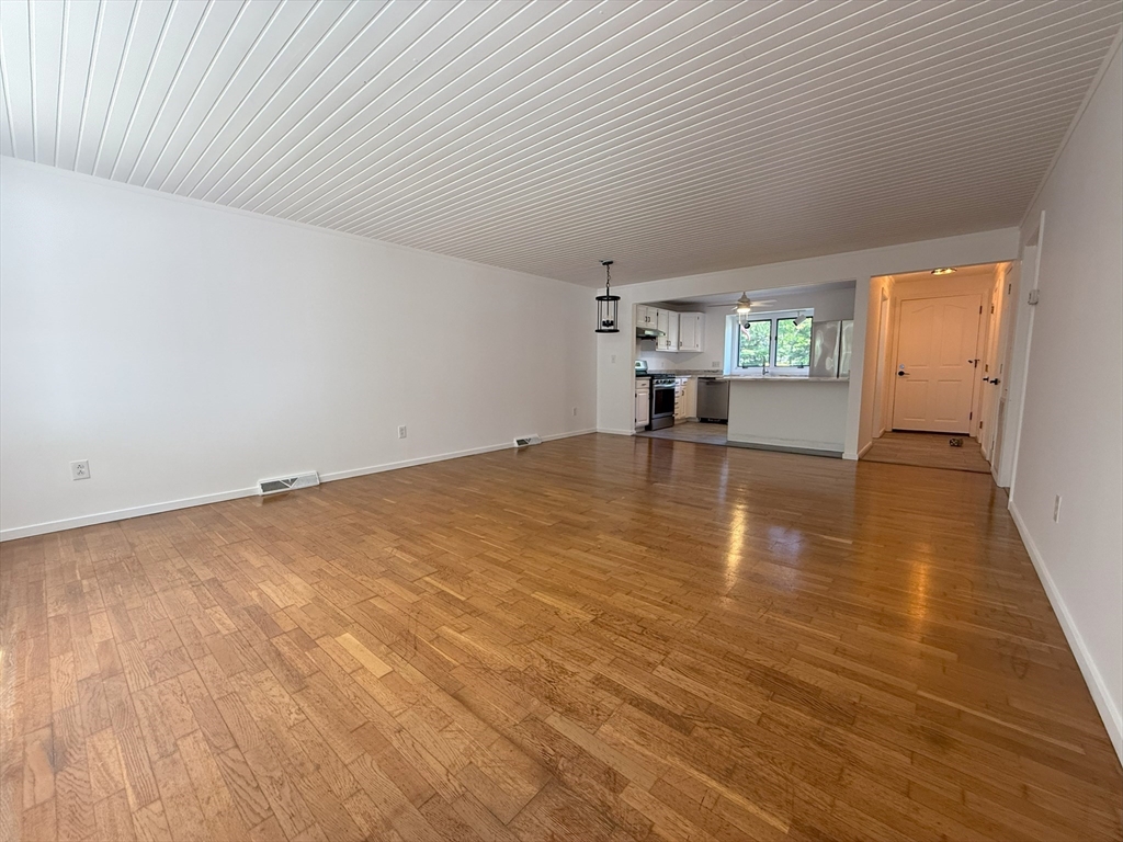51 A Minot Avenue, Unit 1 Wareham, MA 02571 - Photo 9 of 26 a view of empty room with wooden floor