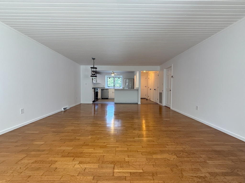 51 A Minot Avenue, Unit 1 Wareham, MA 02571 - Photo 10 of 26 a view of empty room with wooden floor