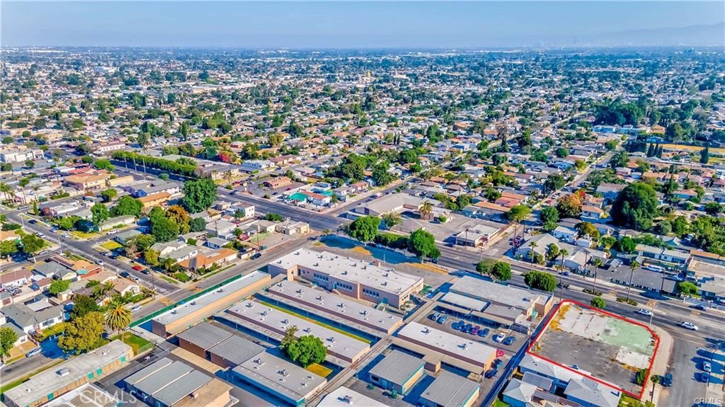 2416 East Alondra Boulevard Compton, CA 90221 - Photo 8 of 10 an aerial view of a city with lots of residential buildings