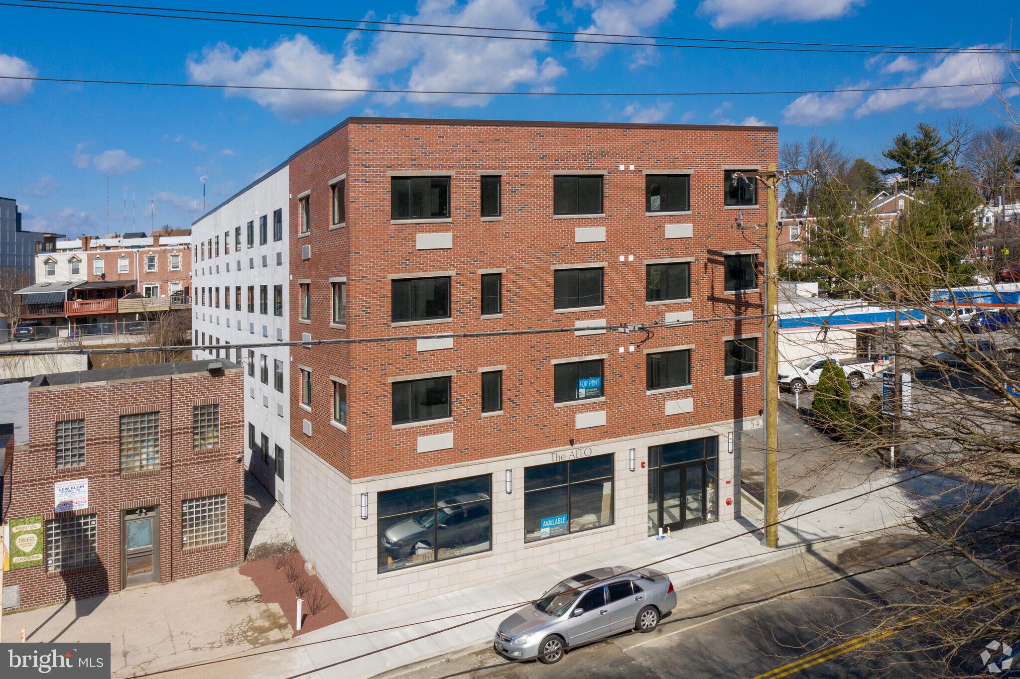 5420 Ridge Avenue, Unit 409 Philadelphia, PA 19128 - Photo 13 of 13 a large building with a street view