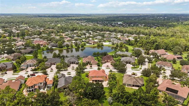 an aerial view of a city with lots of residential buildings