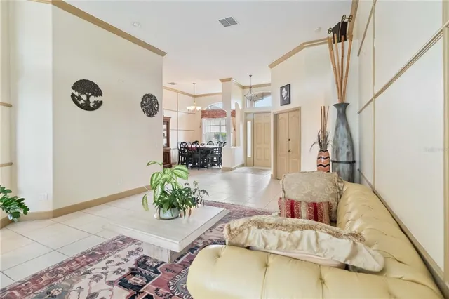 a living room with furniture and a rug