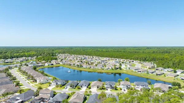 a view of a lake with a houses
