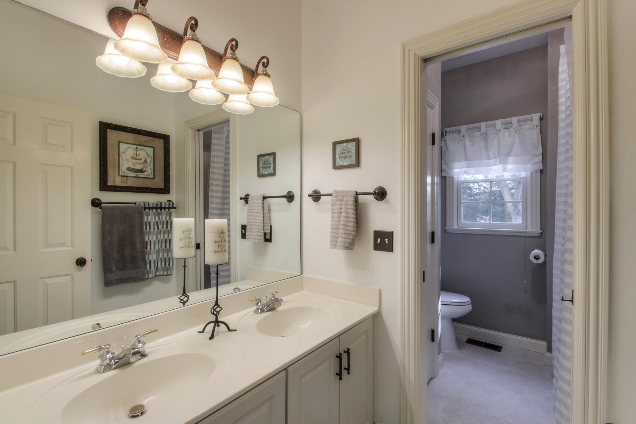 305 Monticello Road Franklin, TN 37069 - Photo 14 of 24 Full Bathroom With Double Vanity And Tub/Shower Combo.