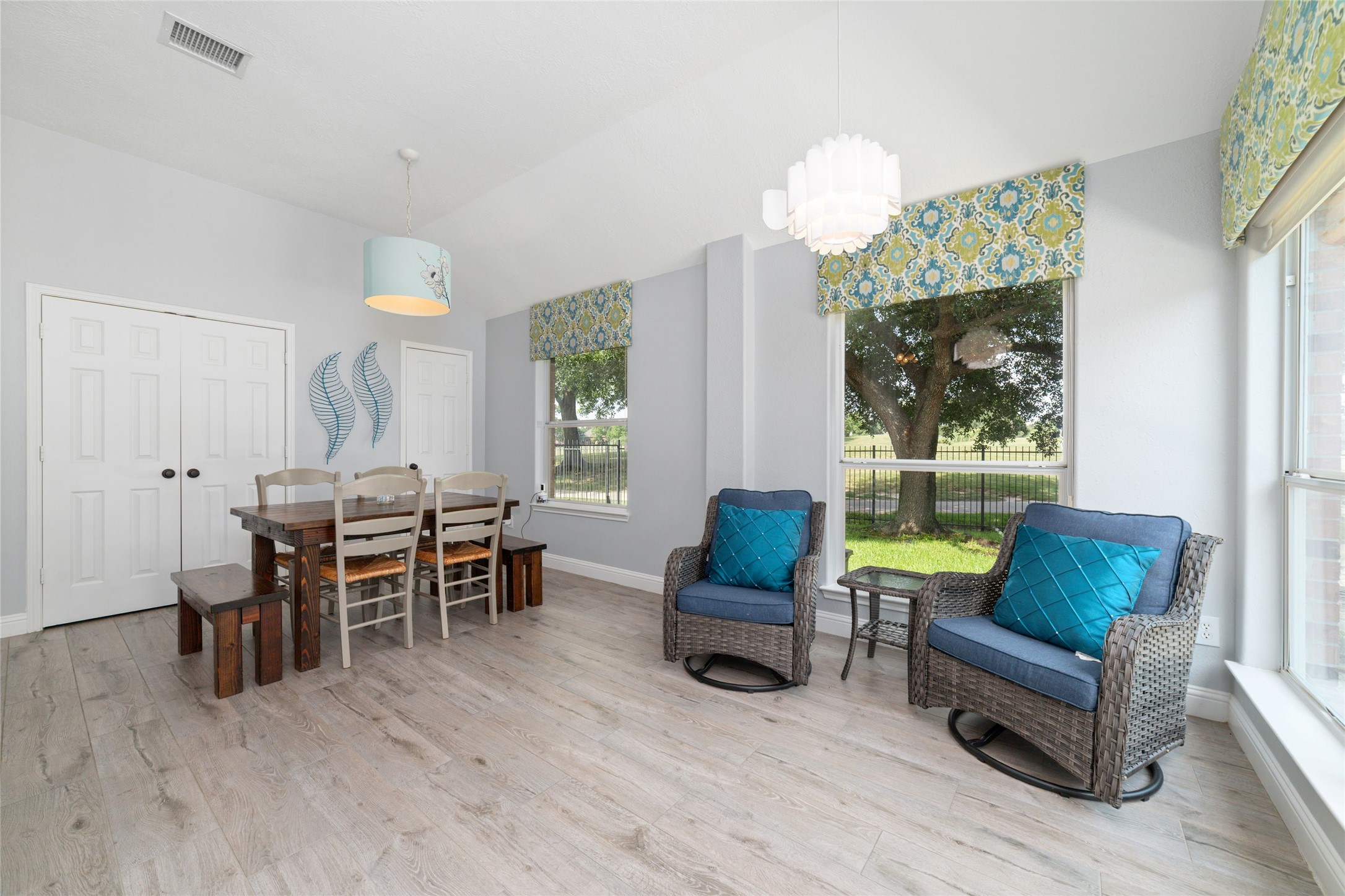 24203 Moon Ridge Court Katy, TX 77494 - Photo 22 of 43 Bright sitting area with large windows offering scenic views. Perfect for enjoying meals or relaxing with a view.