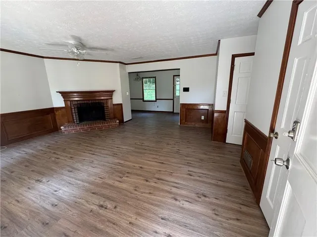 a view of livingroom with furniture and fireplace