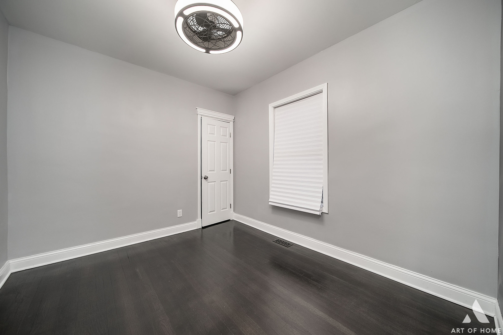 7141 South Artesian Avenue Chicago, IL 60629 - Photo 12 of 31 an empty room with wooden floor and windows