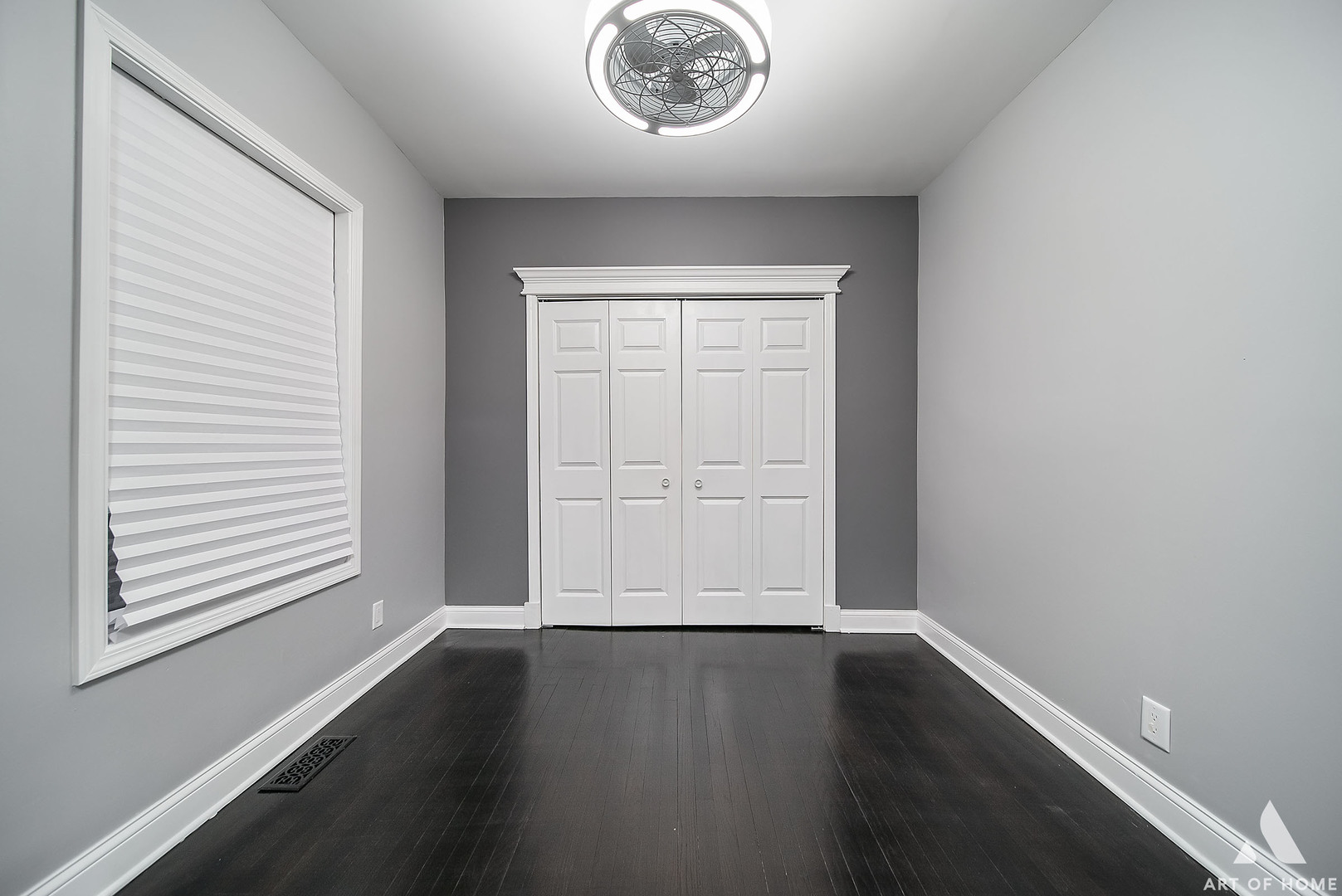 7141 South Artesian Avenue Chicago, IL 60629 - Photo 13 of 31 an empty room with wooden floor and windows