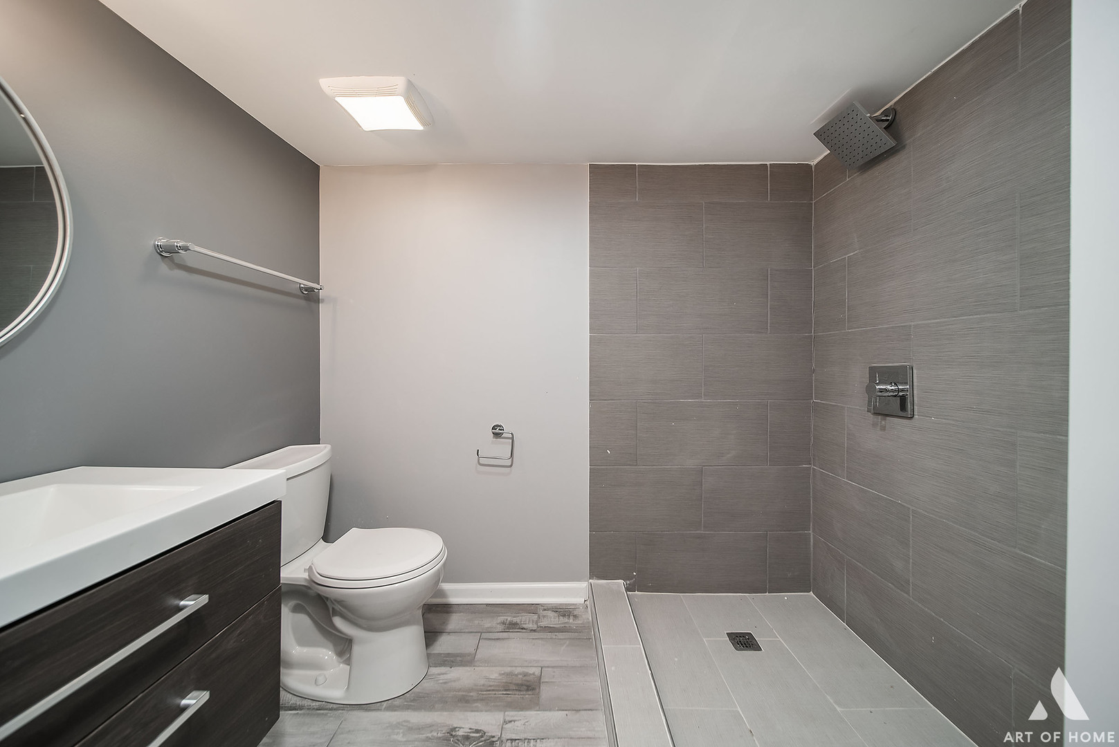 7141 South Artesian Avenue Chicago, IL 60629 - Photo 22 of 31 a bathroom with a toilet a sink and shower