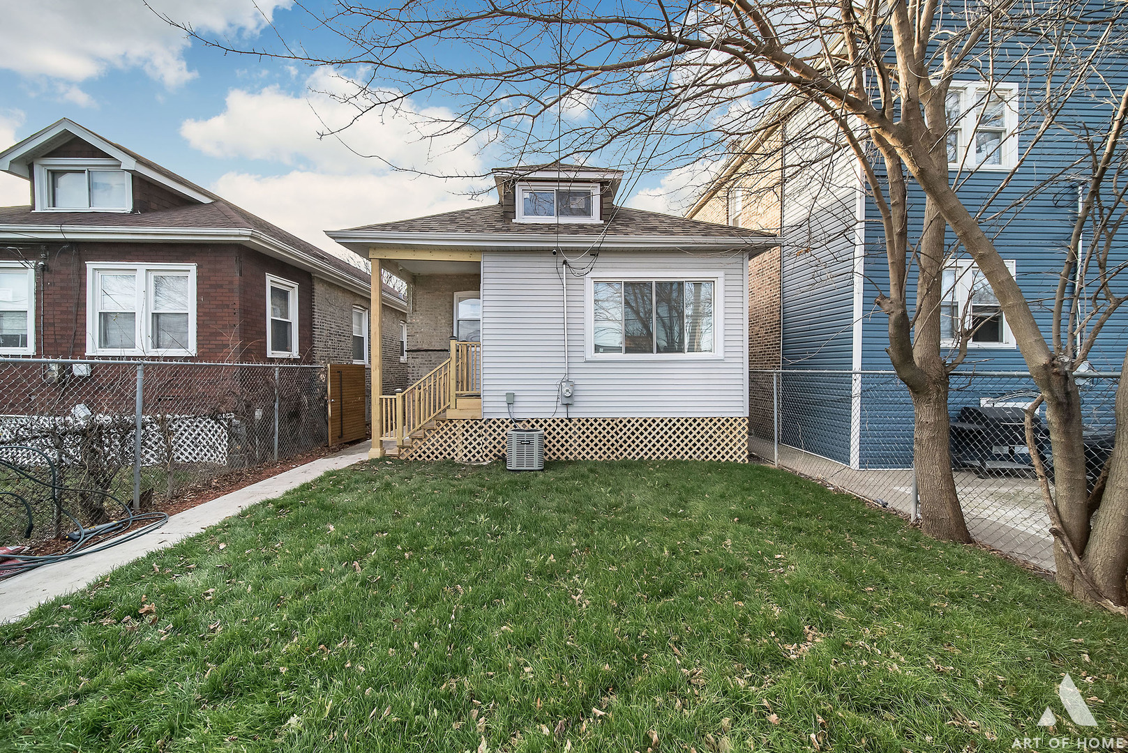 7141 South Artesian Avenue Chicago, IL 60629 - Photo 27 of 31 a view of a house with a yard