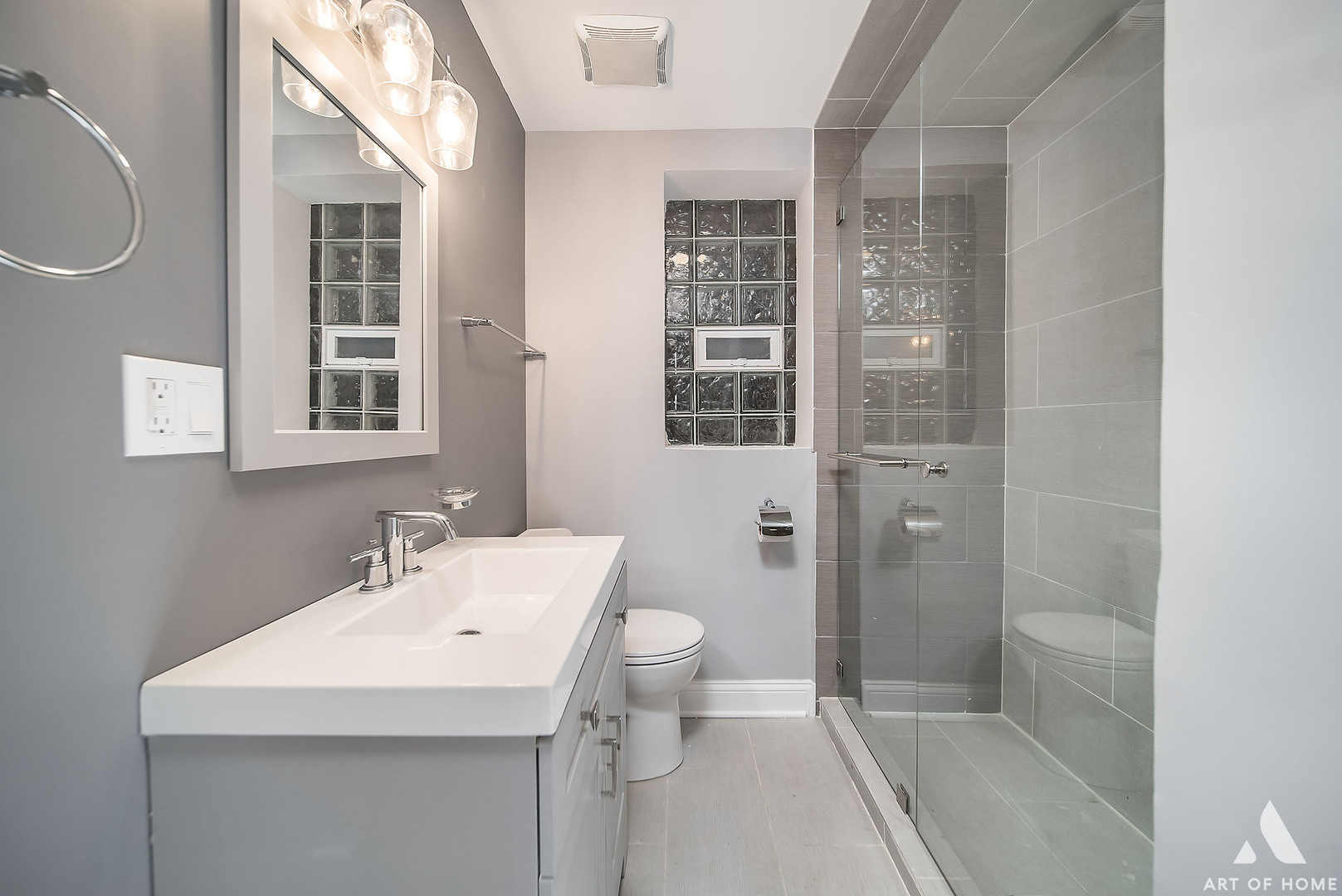 7141 South Artesian Avenue Chicago, IL 60629 - Photo 10 of 31 a bathroom with a sink a toilet and shower